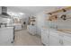 Modern kitchen with stainless steel appliances and lots of counter space at 505 Drolmond Dr, Raleigh, NC 27615