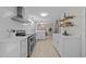 Modern kitchen with stainless steel appliances and lots of counter space at 505 Drolmond Dr, Raleigh, NC 27615