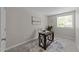 Home office with desk, chair, area rug and window offering natural light at 505 Drolmond Dr, Raleigh, NC 27615