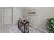 Bright home office space with desk, chair, accent rug, and ample natural light at 505 Drolmond Dr, Raleigh, NC 27615