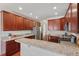 Spacious kitchen with granite countertops, stainless steel appliances, and ample cabinet space for storage at 507 Turmeric Ln, Durham, NC 27713