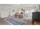 Inviting main bedroom features large windows, cozy furnishings, and a spacious open layout at 507 Turmeric Ln, Durham, NC 27713