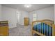 Bedroom featuring carpet, natural light, and neutral paint; ready for your personal touch at 5216 Woods End Rd, Hillsborough, NC 27278
