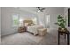 Bright bedroom with natural light, neutral tones, and cozy textures, creating a relaxing and inviting atmosphere at 5216 Woods End Rd, Hillsborough, NC 27278