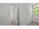Closet area with shelving and natural light; a practical and organized space at 5216 Woods End Rd, Hillsborough, NC 27278