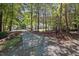 Long driveway leading to the home, surrounded by lush greenery, offering privacy and a sense of arrival at 5216 Woods End Rd, Hillsborough, NC 27278