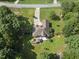 An aerial view of a home featuring a spacious yard, and a long driveway at 55 Kristopher Woods Dr, Youngsville, NC 27596