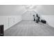 Spacious bonus room featuring carpet, a ceiling fan, and a small window at 55 Kristopher Woods Dr, Youngsville, NC 27596
