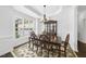 Dining room with a large window, hardwood floors and a chandelier at 55 Kristopher Woods Dr, Youngsville, NC 27596