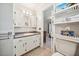 Traditional bathroom with tile floors, a vanity, and a storage unit at 6022 Little Creek Church Rd, Clayton, NC 27520