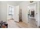 Entryway with open doors leading to a laundry area and office at 6022 Little Creek Church Rd, Clayton, NC 27520