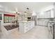 Open kitchen showcasing a large island, modern appliances, and ample space for dining and entertaining at 6022 Little Creek Church Rd, Clayton, NC 27520