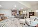 Spacious living room with plenty of seating and an open floor plan, perfect for entertaining at 6022 Little Creek Church Rd, Clayton, NC 27520