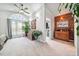 A spacious primary bedroom features a vaulted ceiling, a large window, and ample natural light at 6022 Little Creek Church Rd, Clayton, NC 27520