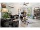 Bright home office featuring two desks, a comfortable chair, and natural light at 6022 Little Creek Church Rd, Clayton, NC 27520