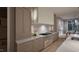 Beautiful kitchen with stone countertops, designer cabinets, and a seamless flow into the dining area at 6736 Brixley Crest Ct, Raleigh, NC 27614