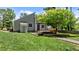 Charming two-story home with landscaped yard and a spacious green lawn at 7309 Forest Glade Ct, Raleigh, NC 27615