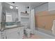 Bathroom featuring a tiled sink, tub, shower, and pink hexagonal floor tiles at 7309 Forest Glade Ct, Raleigh, NC 27615