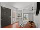 Inviting entryway features hardwood floors, natural light, and a glimpse into the open-concept living space at 7309 Forest Glade Ct, Raleigh, NC 27615