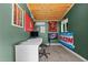 Bright, modern office space with a desk, chair, light wood ceiling, and sports-themed decor at 7309 Forest Glade Ct, Raleigh, NC 27615