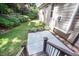 Spacious backyard with concrete patio and well-manicured lawn at 7809 Chestnut Branch Ct, Raleigh, NC 27612