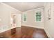 Spacious bedroom with hardwood floors and an ensuite bathroom at 7809 Chestnut Branch Ct, Raleigh, NC 27612