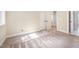 A bedroom features carpeted floors and double doors at 7809 Chestnut Branch Ct, Raleigh, NC 27612