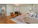 Inviting living room boasting a fireplace, stylish furniture, and bright atmosphere at 8 Mandy Ct, Durham, NC 27707