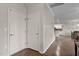 Well-lit hallway leads to other parts of the house, showcasing the home's cohesive design and layout at 8005 Caithness St, Raleigh, NC 27616