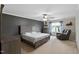 Comfortable main bedroom with a ceiling fan, closet, neutral walls, and carpeted floor at 8005 Caithness St, Raleigh, NC 27616