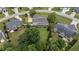 Aerial view featuring the front porch and large backyard with mature trees in a desirable neighborhood at 81 Northcliff Ct, Clayton, NC 27527