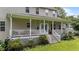 Charming back porch with stairs to the backyard, perfect for outdoor relaxation at 81 Northcliff Ct, Clayton, NC 27527