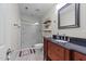 Modern bathroom with a glass-enclosed shower and a vanity with storage at 81 Northcliff Ct, Clayton, NC 27527