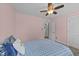 Inviting bedroom with a cozy bed and natural light from the window at 81 Northcliff Ct, Clayton, NC 27527