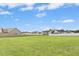 Large, flat backyard, surrounded by neighboring houses at 81 Olive Branch Dr, Smithfield, NC 27577