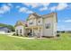 Beautiful two-story home featuring a covered porch and large, green front yard at 81 Olive Branch Dr, Smithfield, NC 27577
