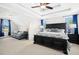 Spacious main bedroom with tray ceilings, a ceiling fan, and ample natural light at 81 Olive Branch Dr, Smithfield, NC 27577