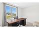 Home office with large window, desk, office chair, and bright natural light at 81 Olive Branch Dr, Smithfield, NC 27577