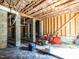 Unfinished basement with insulation, concrete columns, and a black membrane on the floor at 857 Stable Fern Dr, Fuquay Varina, NC 27526