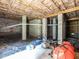 Unfinished basement with concrete block walls and exposed ceiling, ready for customization and storage at 857 Stable Fern Dr, Fuquay Varina, NC 27526