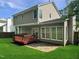 Backyard featuring a deck, patio, and green lawn at 8640 Swarthmore Dr, Raleigh, NC 27615