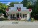 Charming vintage storefront featuring Coca-Cola signage and rustic decor at 94 Bynum Church Rd, Pittsboro, NC 27312
