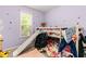 A lively bedroom with a bunk bed, slide, and playful decor at 99 Winwood Dr, Angier, NC 27501
