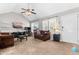 Comfortable living room with vaulted ceilings, ceiling fan, and plenty of natural light at 99 Winwood Dr, Angier, NC 27501
