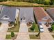 Aerial view of home with manicured lawn and established landscaping at 1019 Santiago St, Durham, NC 27703