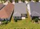 Aerial view of home with green lawn and established landscaping at 1019 Santiago St, Durham, NC 27703