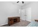 Bedroom with neutral walls, carpeted floor, and built in cabinet at 1019 Santiago St, Durham, NC 27703