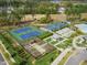 Aerial view of community tennis courts, gardens, and recreational areas at 1019 Santiago St, Durham, NC 27703