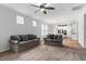 Bright living room showcases neutral walls, carpet, and access to the kitchen at 1019 Santiago St, Durham, NC 27703
