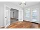 Bright office space with hardwood floors, french doors, and a large window with access to backyard at 1019 Santiago St, Durham, NC 27703